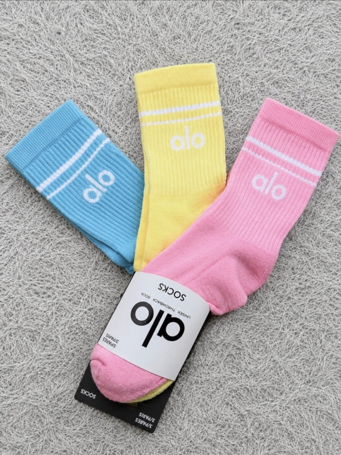 Calcetines Alo azul, amarillo y rosa con franjas blancas